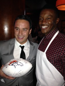 Broncos receiver Wes Welker poses with guest Bradley Joseph, above. Below, Broncos receiover Demaryius Thomas show off Bryant Gunn's autpographed football during Von Miller's celebrity waiter event for his charity, Von's Vision.