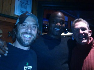 Rashaan Salaam, center, posts with his Cherry Cricket waiter, left, and Mark McIntosh. (Photo courtesy of Mark McIntosh's Facebook page).