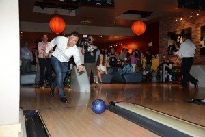 Carlos Gonzalez shows off his bowling form.