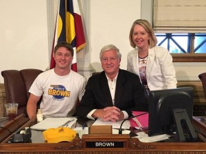 Charlie Brown, center, with son Nick and wife Suzanne on his final day as a Denver city councilman. (Nick Brown Facebook photo)